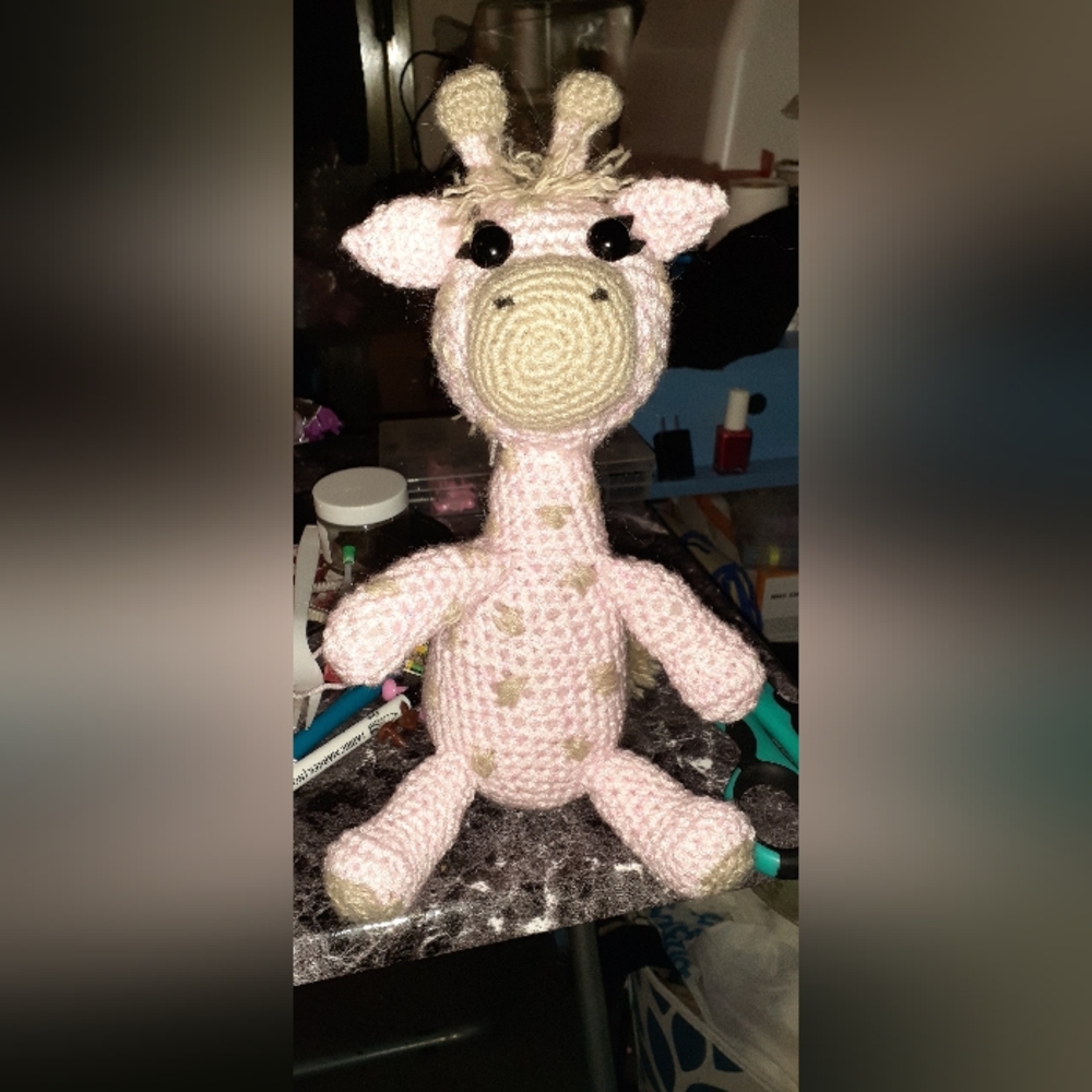 Pink and brown amigurumi giraffe